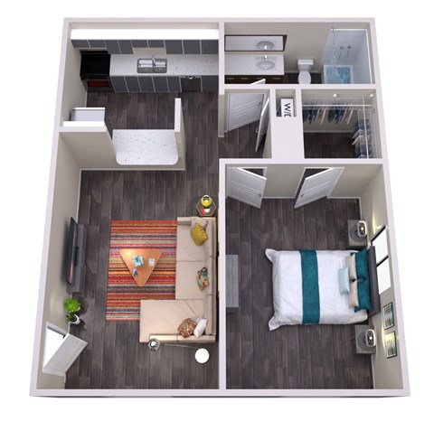 A top down view of a small apartment with a living room, kitchen and bedroom.